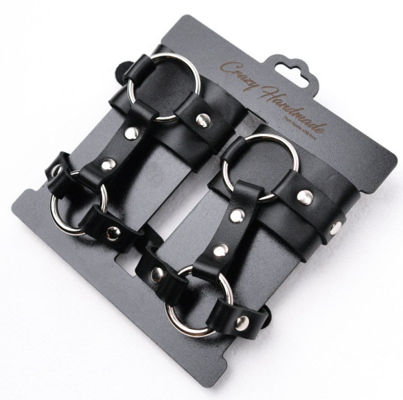 Черные наручники с креплением на кисть руки Черные наручники с креплением на кисть руки