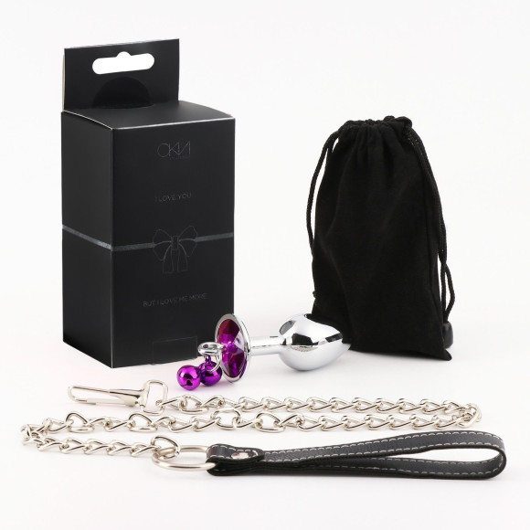 Серебристая анальная пробка с фиолетовым кристаллом, колокольчиками и поводком Серебристая анальная пробка с фиолетовым кристаллом, колокольчиками и поводком